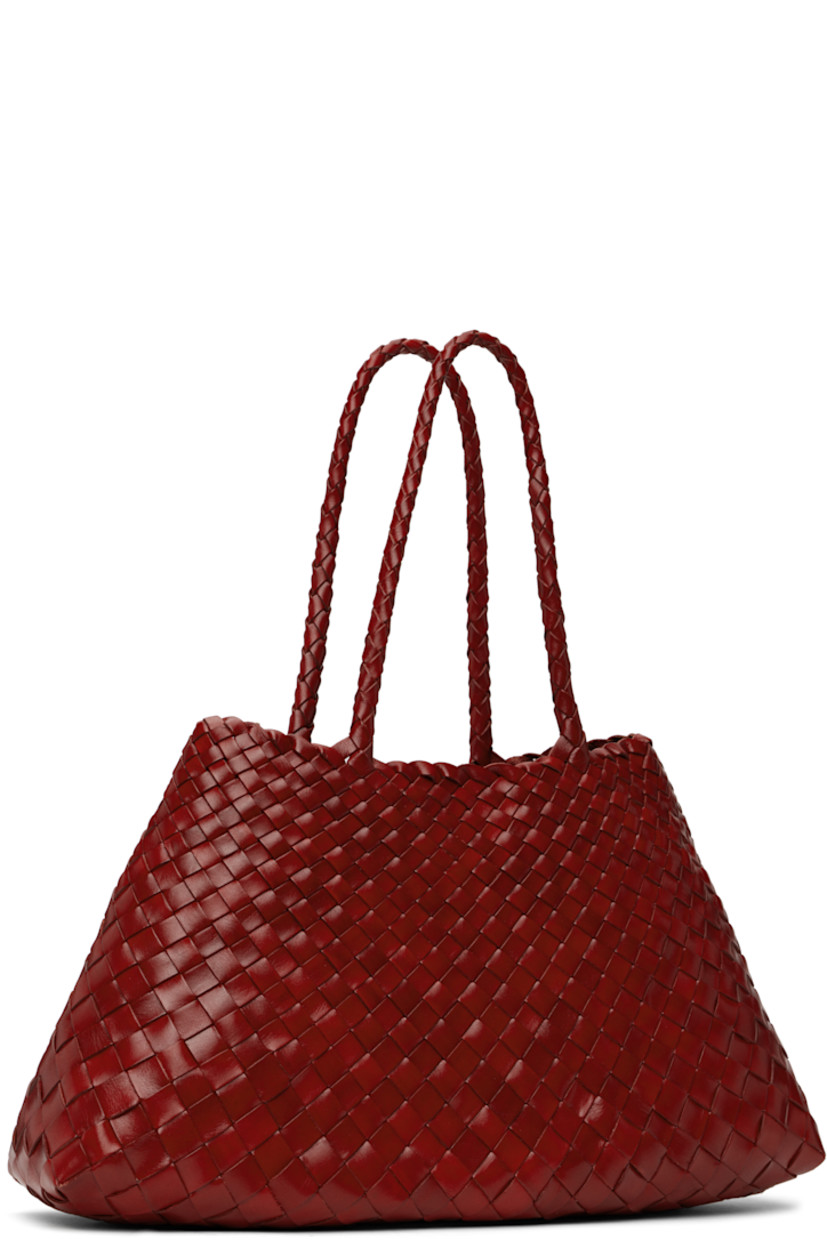 Handcrafted basket-woven buffalo calfskin tote in red.

· Twin carry handles
· Open throat
· Logo disc hand-sewn at interior
· Unlined
· H8.75" x W17.5" x D6"
· Total height: H17.5"

Supplier color: Poppy red