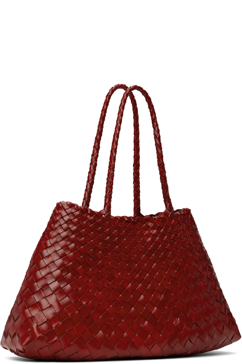 Handcrafted basket-woven buffalo calfskin tote in red.

· Twin carry handles
· Open throat
· Logo disc hand-sewn at interior
· Unlined
· H8.75" x W17.5" x D6"
· Total height: H17.5"

Supplier color: Poppy red