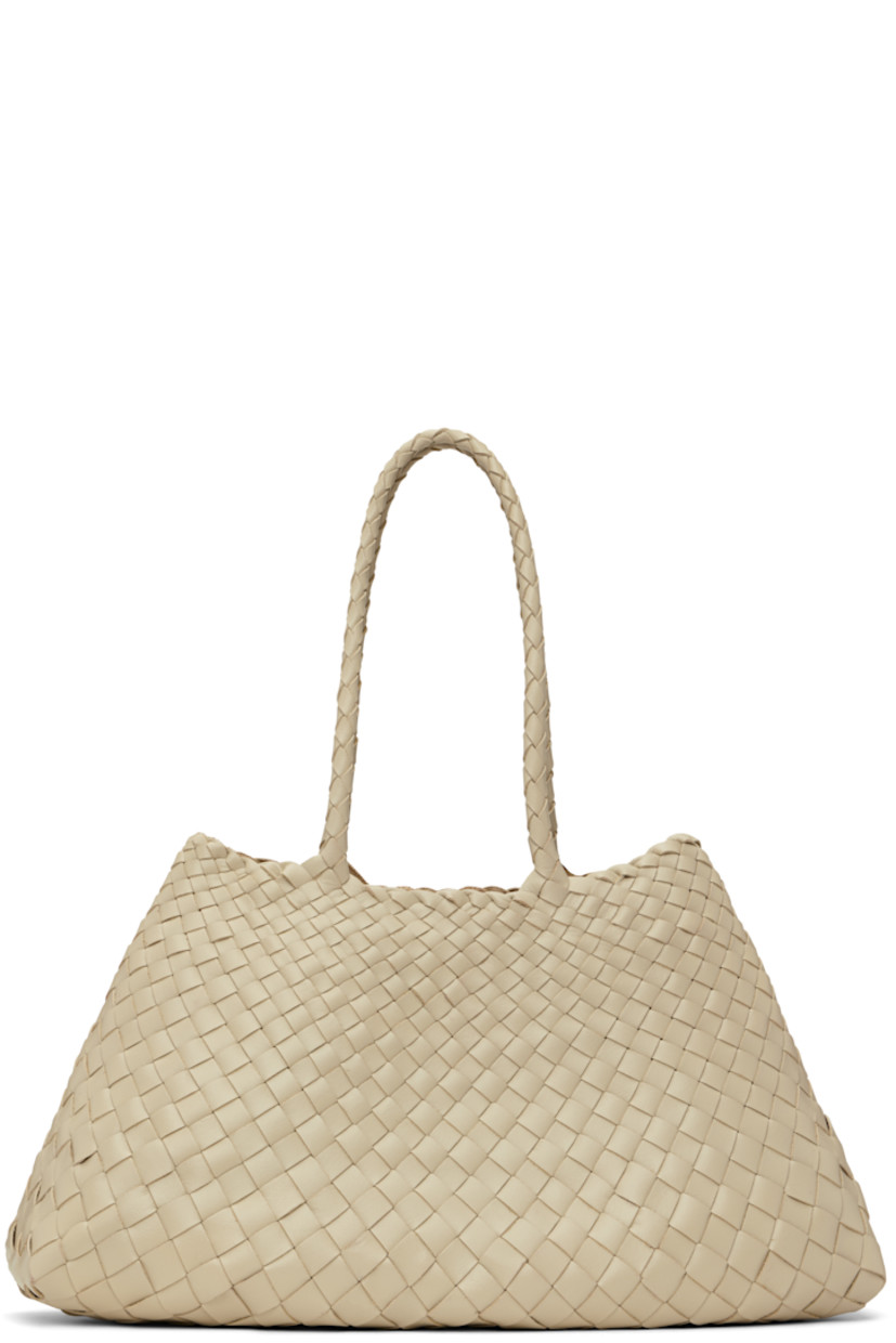 Handcrafted basket-woven buffalo calfskin tote in off-white.

· Twin carry handles
· Open throat
· Logo disc hand-sewn at interior
· Unlined
· H8.75" x W17.5" x D6"
· Total height: H17.5"

Supplier color: Pearl