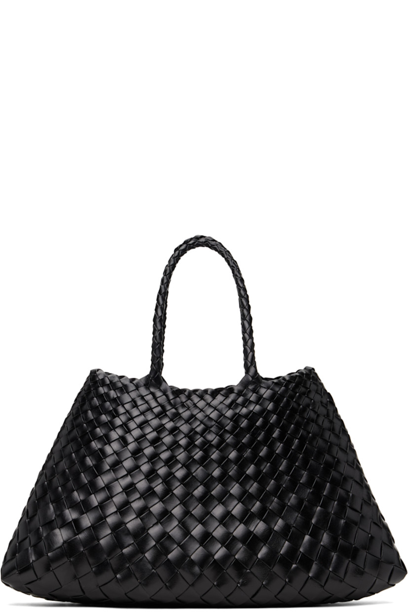 Handcrafted basket-woven buffalo calfskin tote in black.

· Twin carry handles
· Open throat
· Logo disc hand-sewn at interior
· Unlined
· H6.5" x W16" x D4.5"
· Total height: H14"

Supplier color: Black