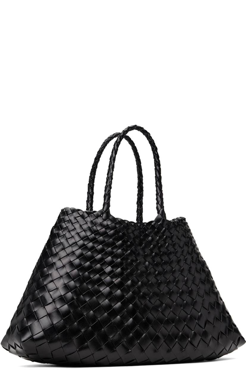 Handcrafted basket-woven buffalo calfskin tote in black.

· Twin carry handles
· Open throat
· Logo disc hand-sewn at interior
· Unlined
· H6.5" x W16" x D4.5"
· Total height: H14"

Supplier color: Black