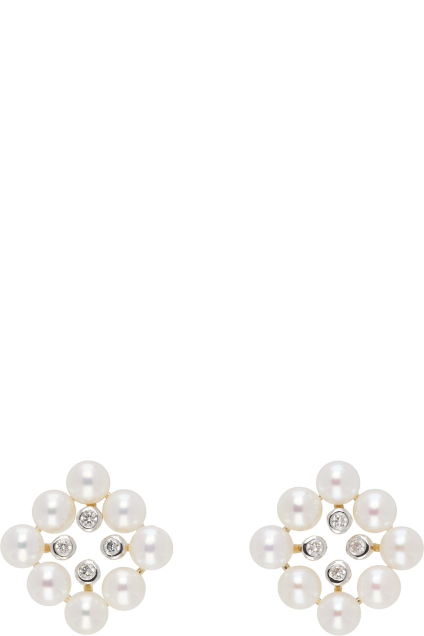 Pair of stud earrings in 14k gold. 

· Freshwater pearls at face
· Bezel-set 0.24 cttw diamonds
· Post-stud fastening 
· H0.75" x W0.75"

Supplier color: 14kt yg 5mm pearls