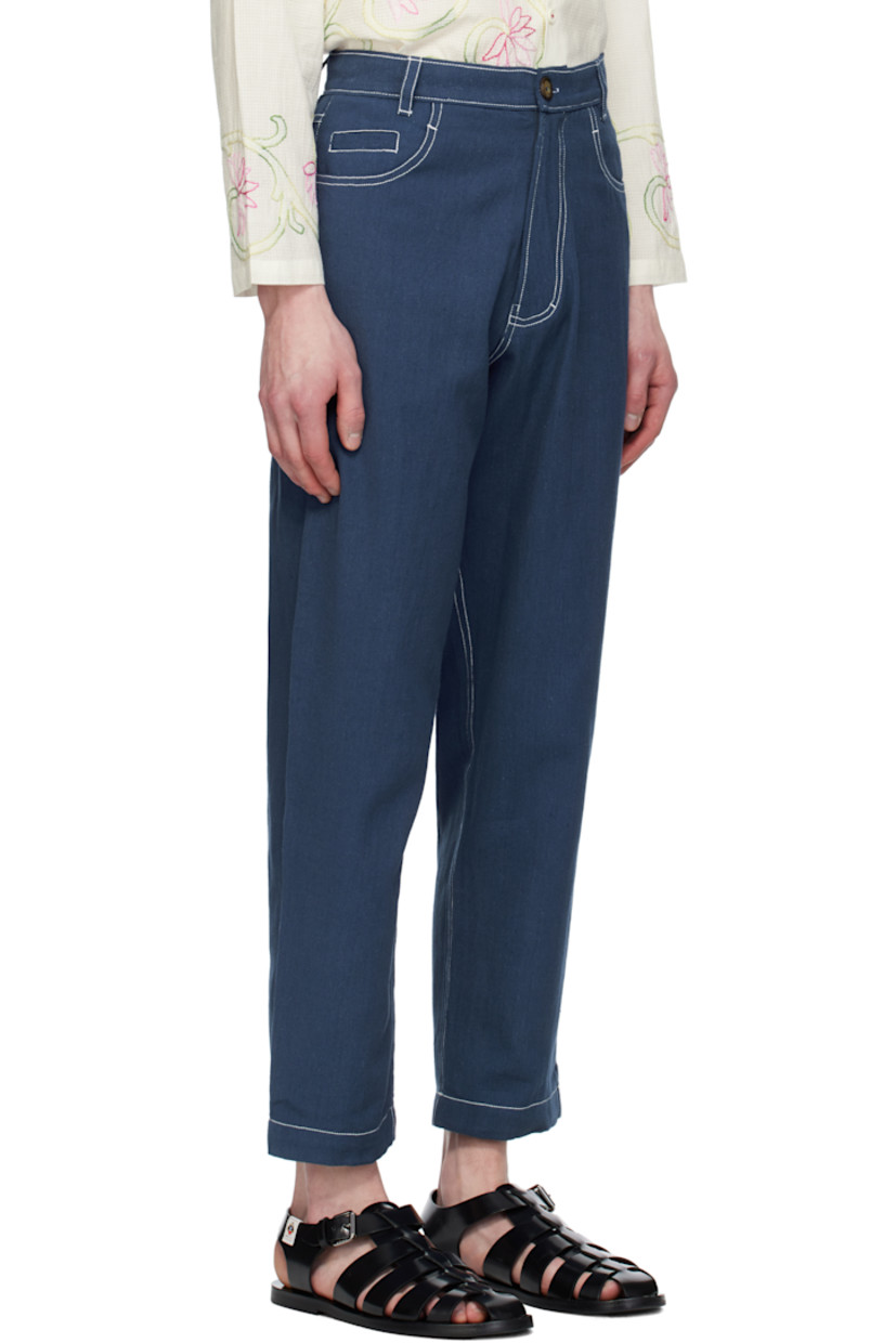 Hand-woven cotton hopsack trousers. 

· Belt loops
· Five-pocket styling
· Zip fly
· Contrast stitching in white

Supplier color: Indigo