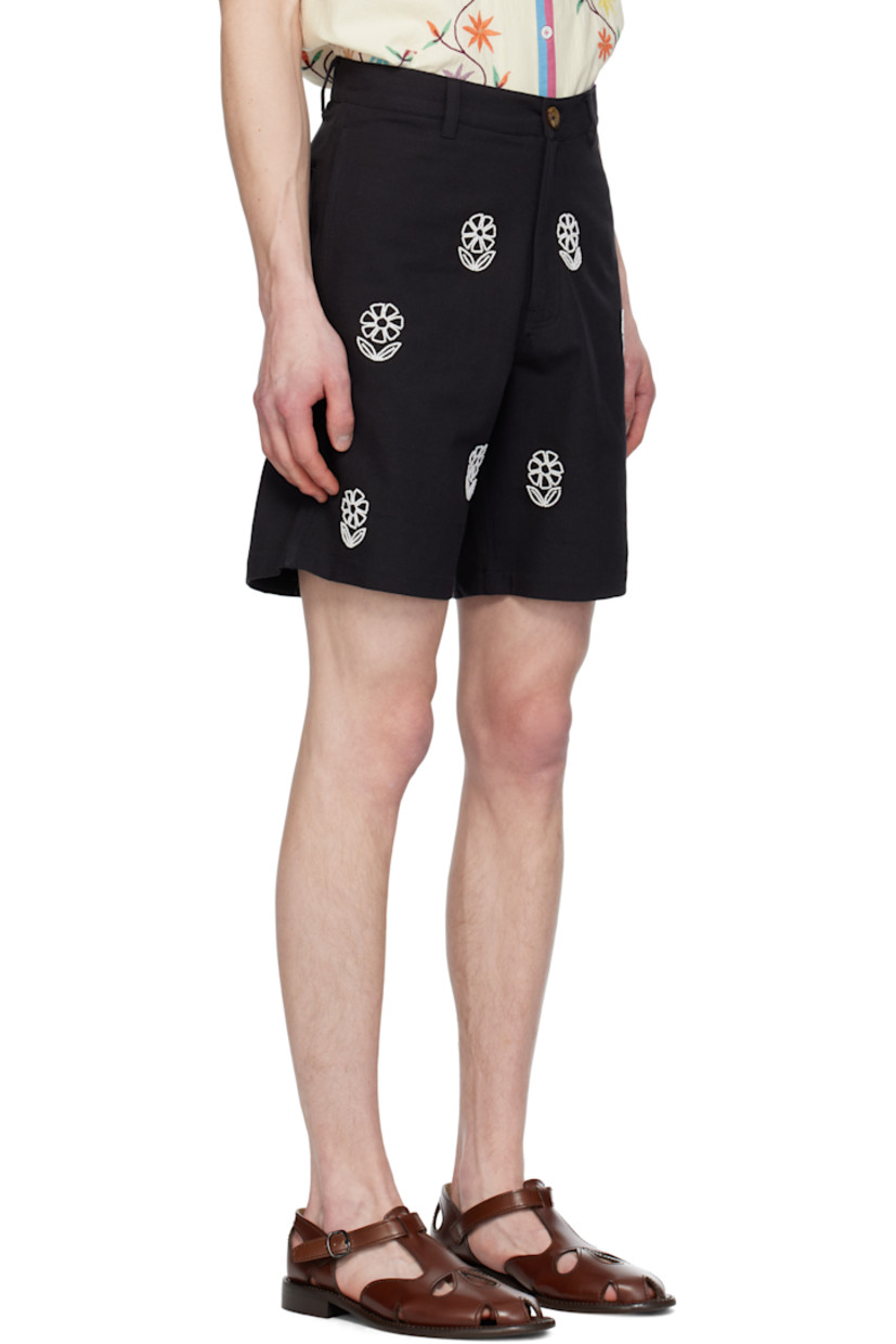 Hand-woven cotton hopsack shorts.

· Belt loops
· Four-pocket styling
· Zip fly 
· Beaded floral pattern at front 

Supplier color: Black