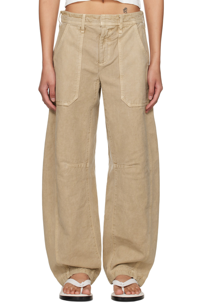 Tapered garment-dyed lightweight cotton canvas cargo pants. 

· BCI-certified
· Low-rise
· Belt loops
· Four-pocket styling
· Zip fly
· Tuck at knees
· Curved outseams

Supplier color: Marfa sands