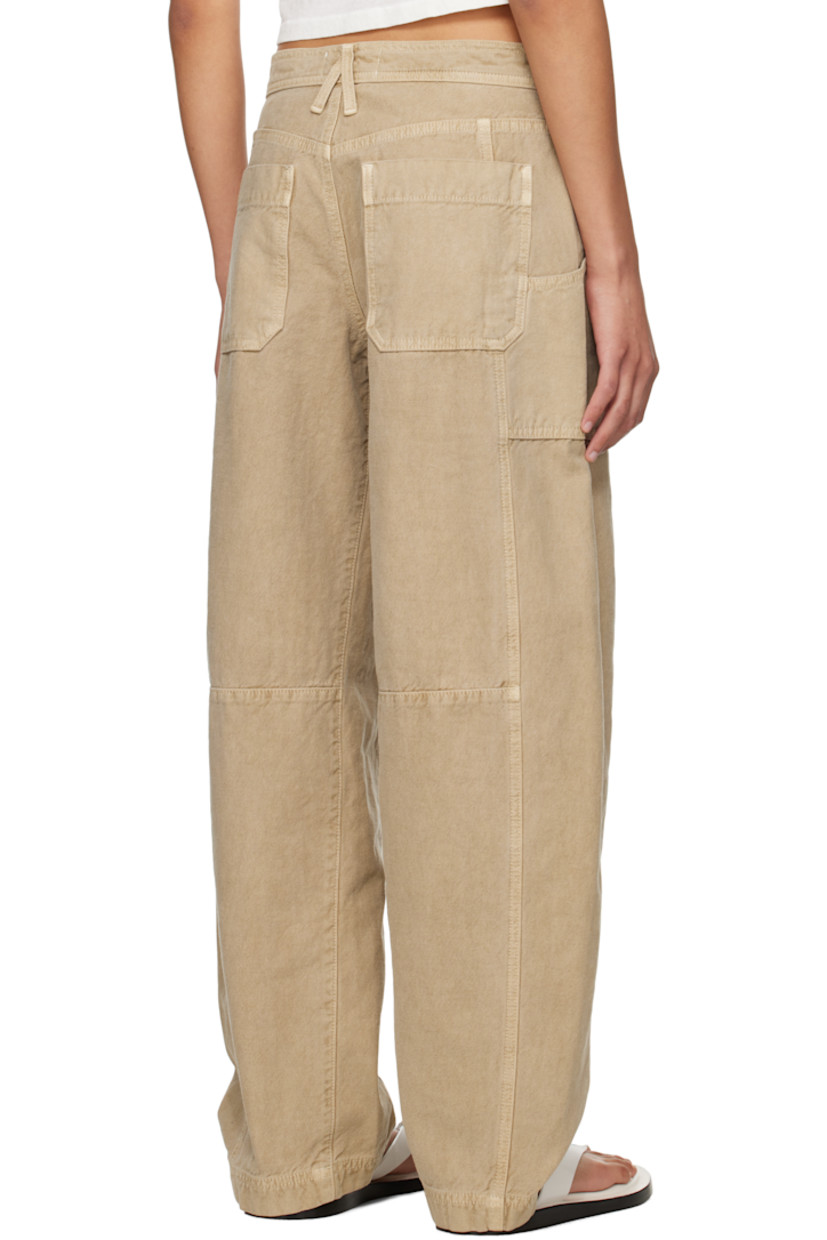 Tapered garment-dyed lightweight cotton canvas cargo pants. 

· BCI-certified
· Low-rise
· Belt loops
· Four-pocket styling
· Zip fly
· Tuck at knees
· Curved outseams

Supplier color: Marfa sands