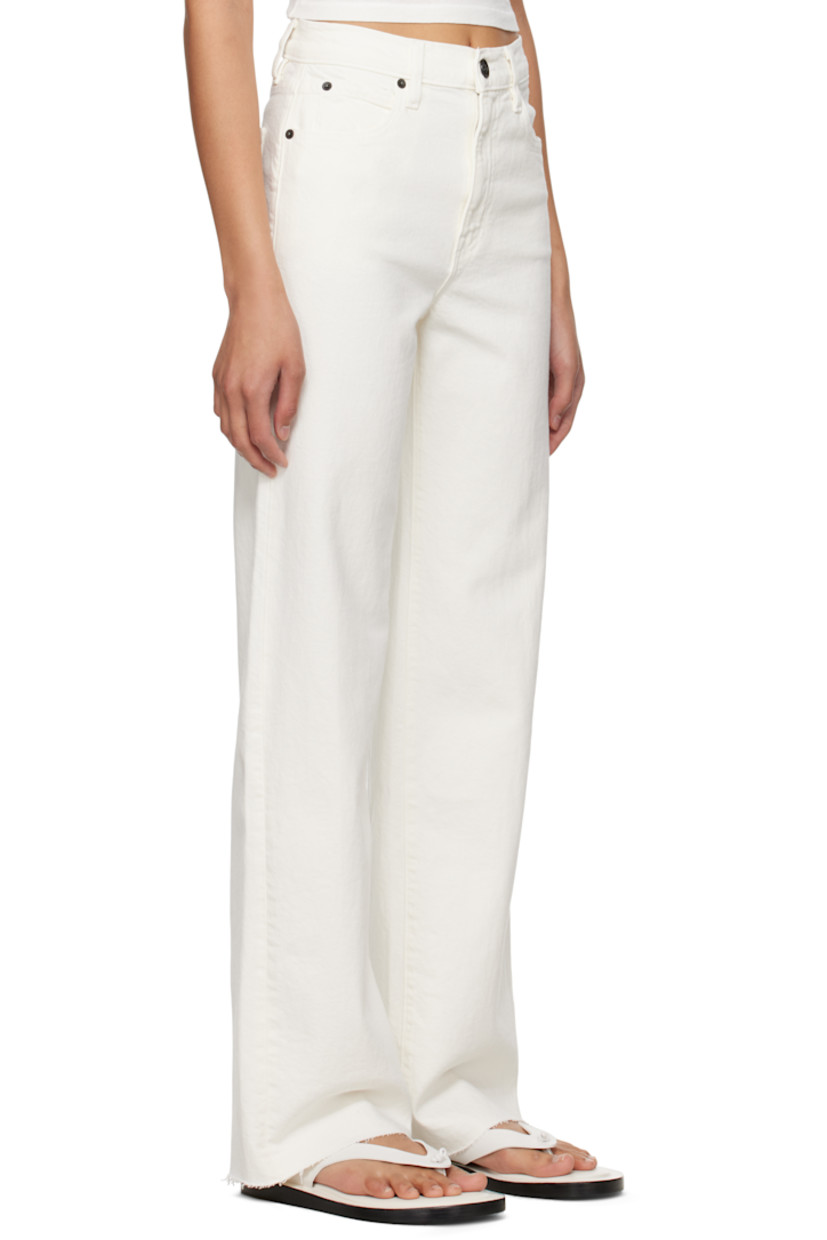 Wide-leg stretch denim jeans. 

· High-rise 
· Belt loops
· Five-pocket styling
· Zip fly
· Raw edge at cuffs

Supplier color: White