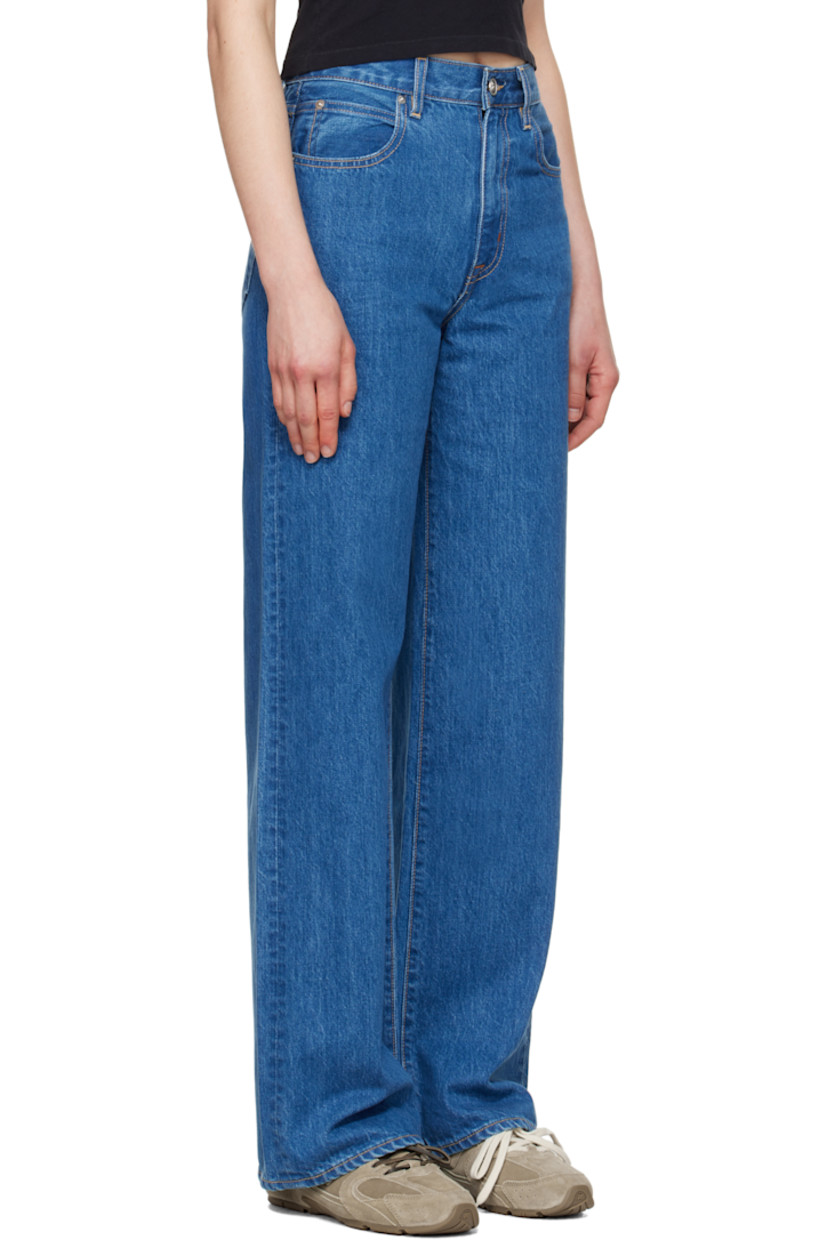 Wide-leg non-stretch denim jeans. Fading throughout.

· High-rise
· Belt loops
· Five-pocket styling
· Zip-fly
· Logo-engraved silver-tone hardware
· Contrast stitching in tan

Supplier color: Freedom