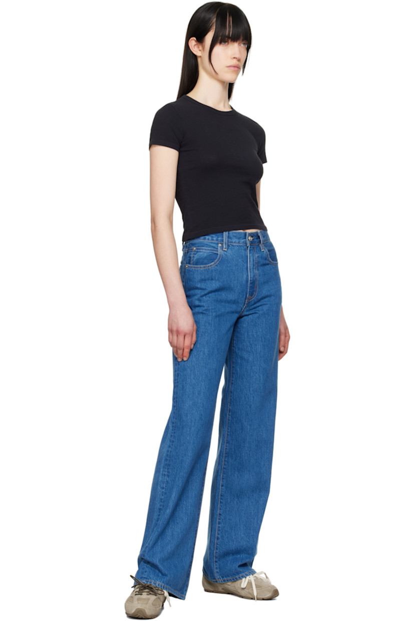 Wide-leg non-stretch denim jeans. Fading throughout.

· High-rise
· Belt loops
· Five-pocket styling
· Zip-fly
· Logo-engraved silver-tone hardware
· Contrast stitching in tan

Supplier color: Freedom