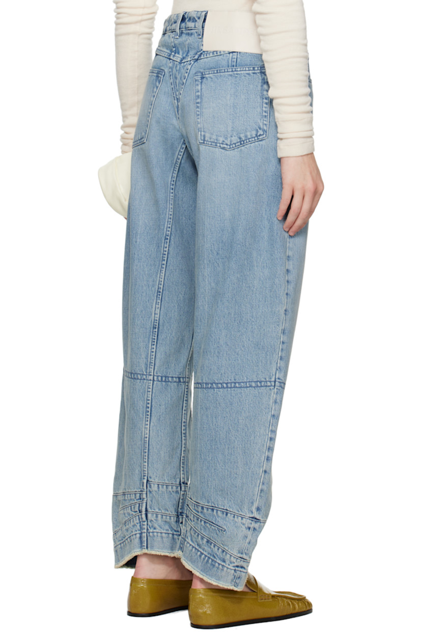 Loose-fit non-stretch organic cotton denim jeans. Fading and whiskering throughout.

· Paneled construction
· Belt loops
· Five-pocket styling
· Button fly
· Darts and frayed edge at cuffs
· Logo patch at back waistband 

Supplier color: Antarctic
