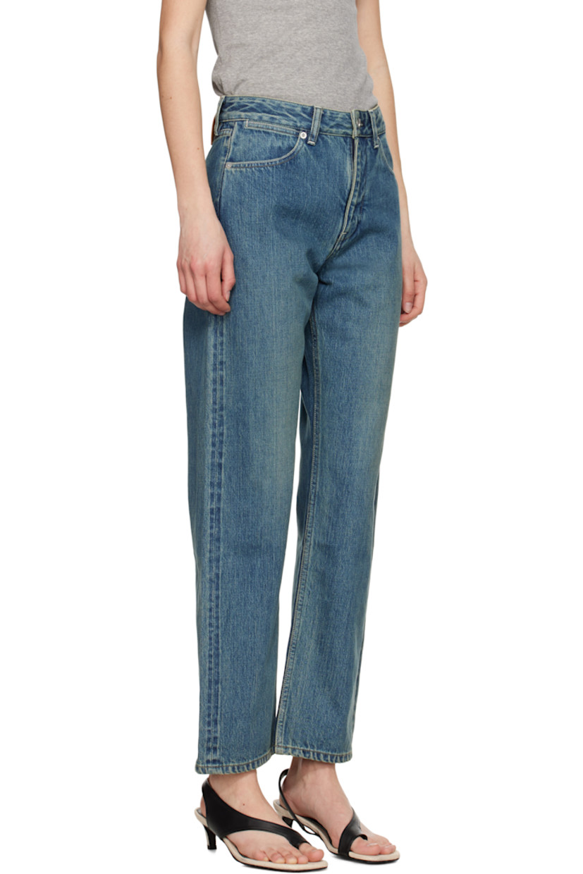 Non-stretch denim jeans. Subtle fading throughout.

· Belt loops
· Five-pocket styling
· Zip fly
· Leather logo patch at back waistband
· Silver-tone hardware
· Contrast stitching in off-white

Supplier color: Blue