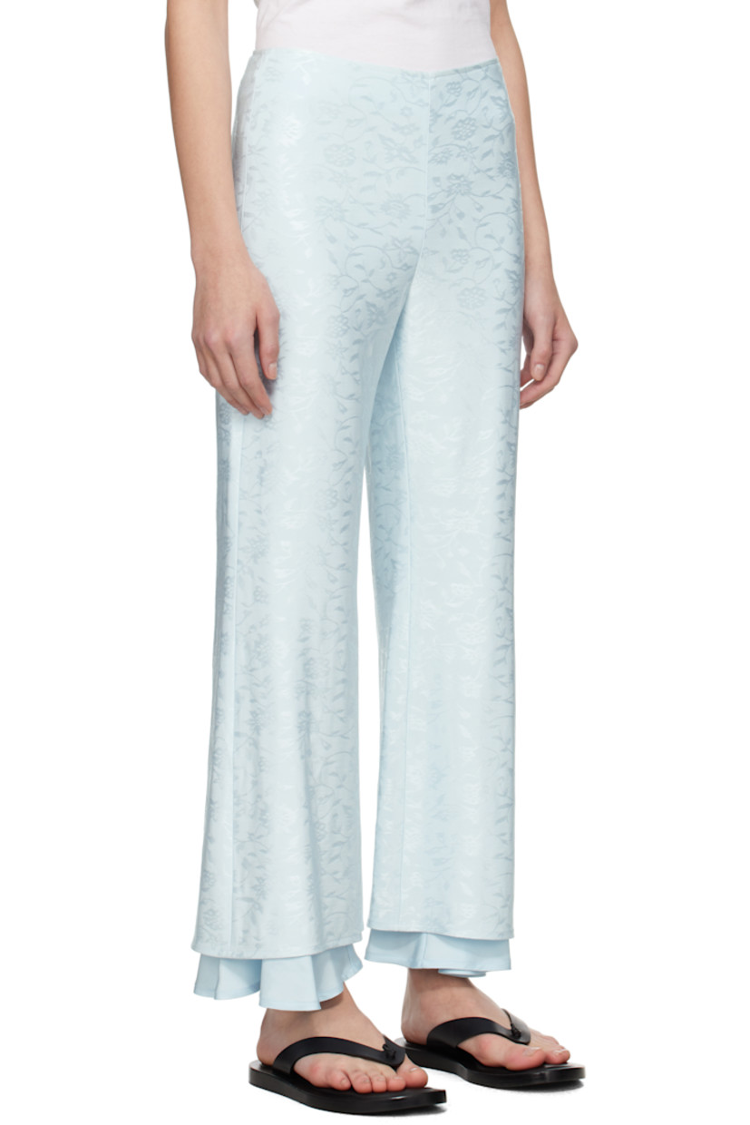 Stretch viscose jersey trousers. Jacquard floral pattern throughout.

· Layered construction
· Darts at waistband
· Concealed zip closure at side seam
· Full viscose twill lining

Supplier color: Sky