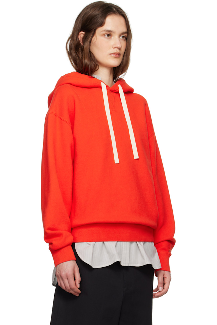 French terry hoodie.

· Drawstring at hood
· Rib-knit hem and cuffs
· Dropped shoulders

Supplier color: Poppy