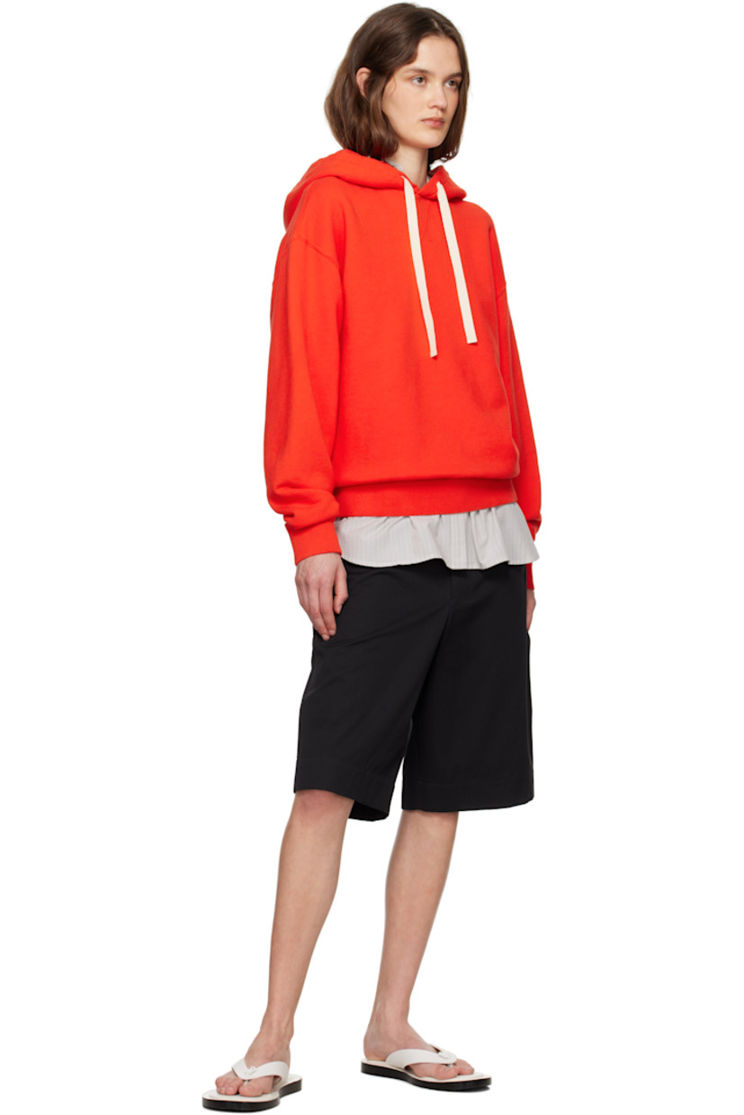 French terry hoodie.

· Drawstring at hood
· Rib-knit hem and cuffs
· Dropped shoulders

Supplier color: Poppy