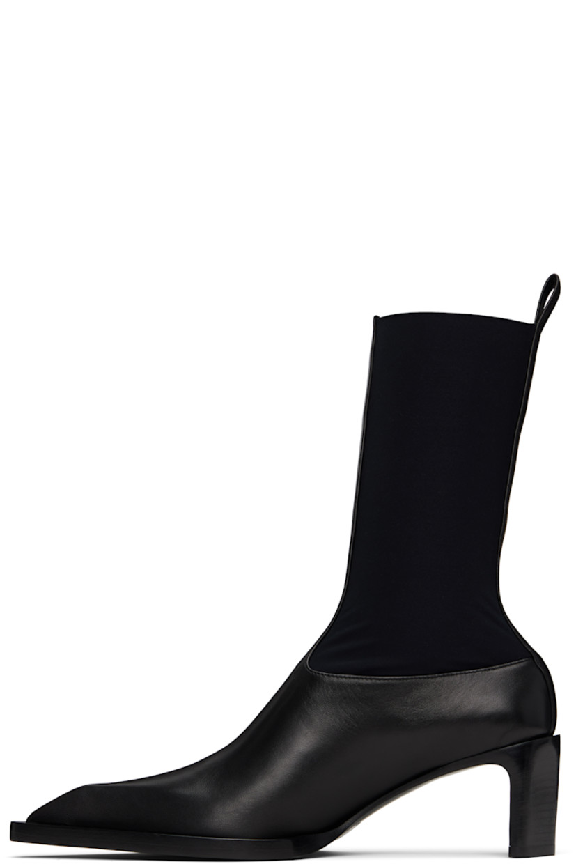 Ankle-high buffed sheepskin and bonded jersey boots in black.

· Pointed toe
· Sock-style collar
· Pull-loop at heel collar
· Buffed nappa leather lining
· Stacked leather heel with rubber injection
· Calfskin sole with rubber injection
· Heel: H2.5"

Supplier color: Black