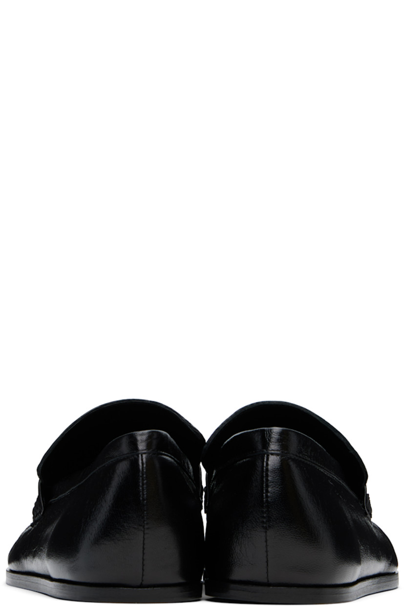 Hand-stitched crinkled sheepskin loafers in black.

· Gathering at square moc toe
· Strap at vamp
· Nappa leather insole and lining
· Polished calfskin sole with rubber injections

Supplier color: Black