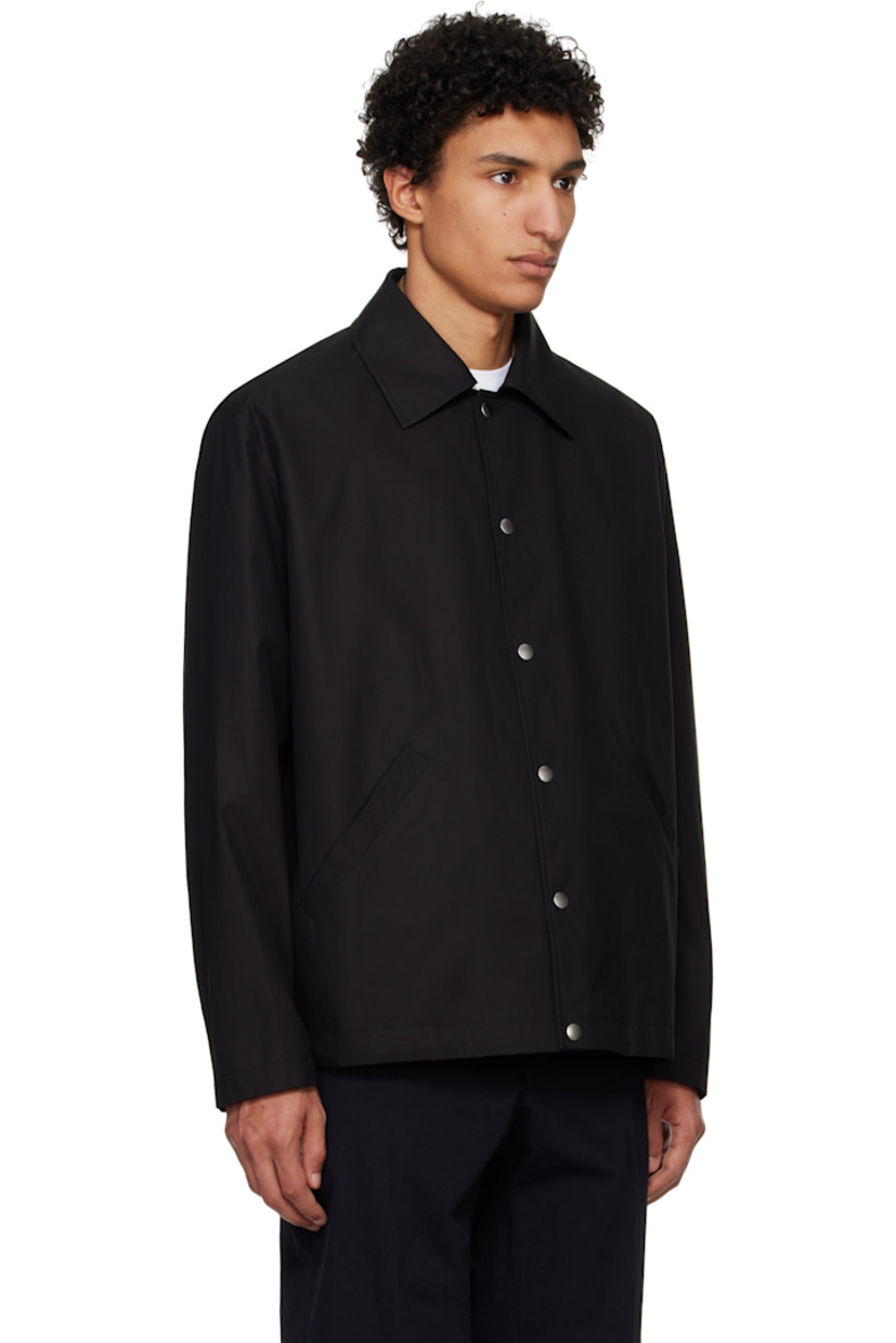 Relaxed-fit lightweight cotton poplin jacket. 

· Spread collar
· Press-stud closure 
· Welt pockets
· Press-stud fastening at cuffs
· Logo printed at back
· Patch pocket at interior
· Partial plain-woven cotton lining

Supplier color: Black