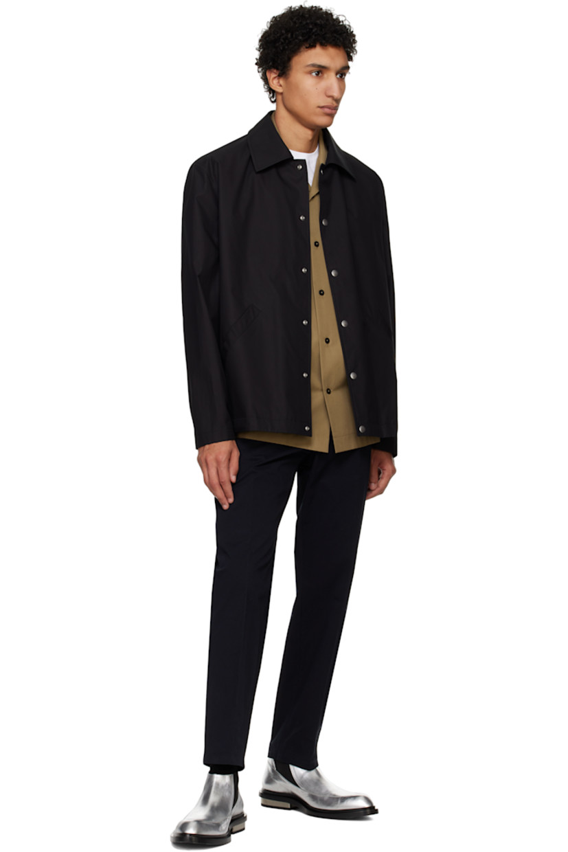Relaxed-fit lightweight cotton poplin jacket. 

· Spread collar
· Press-stud closure 
· Welt pockets
· Press-stud fastening at cuffs
· Logo printed at back
· Patch pocket at interior
· Partial plain-woven cotton lining

Supplier color: Black