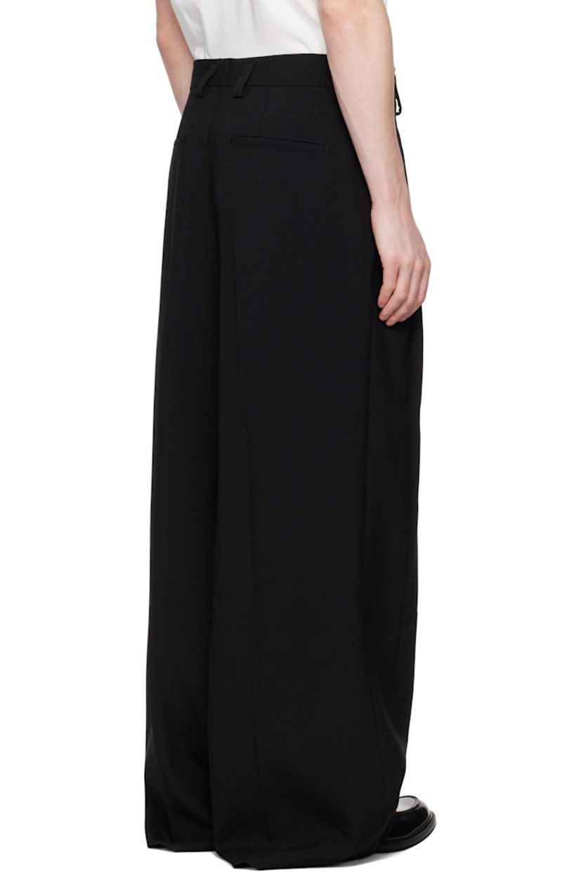 Wool crêpe trousers.

· Belt loops
· Four-pocket styling
· Zip fly
· Pleats at front
· Creased legs
· Partial viscose satin lining

Supplier color: Black