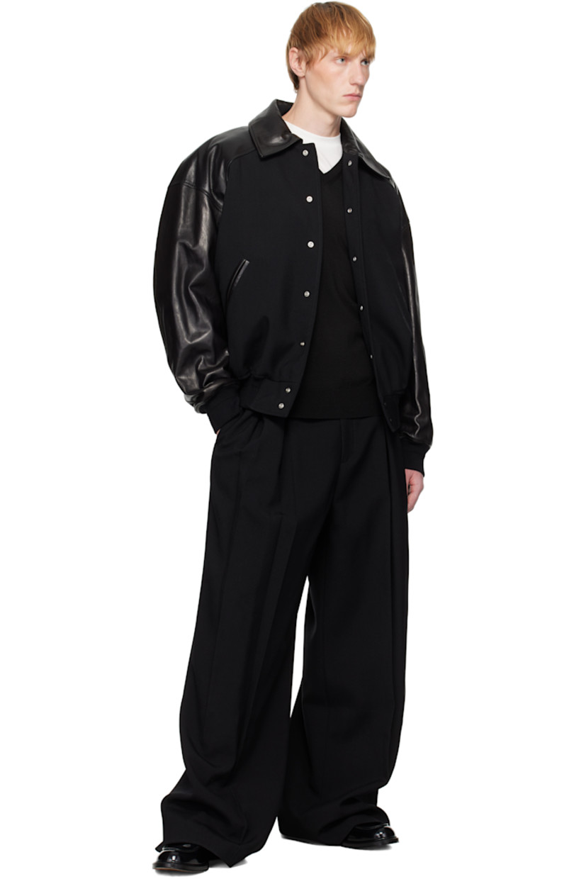 Wool crêpe trousers.

· Belt loops
· Four-pocket styling
· Zip fly
· Pleats at front
· Creased legs
· Partial viscose satin lining

Supplier color: Black