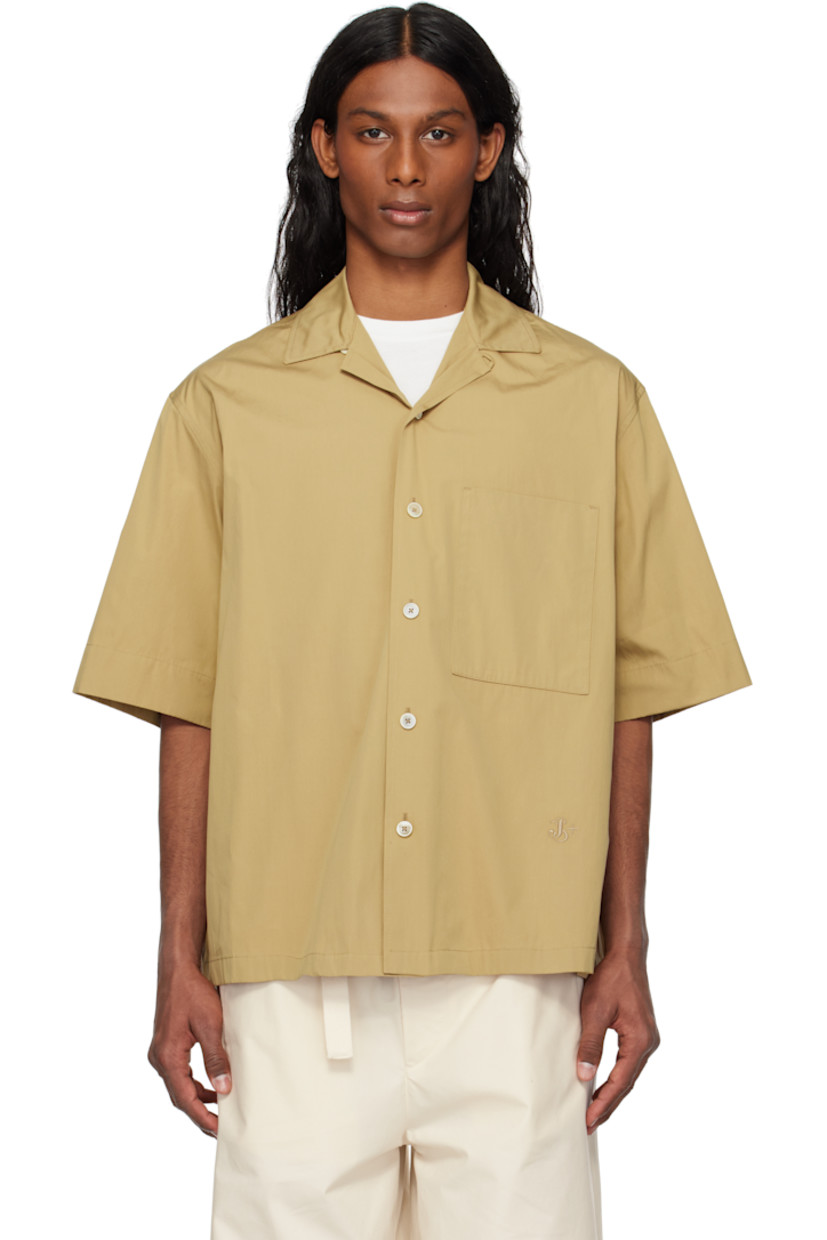 Loose-fit cotton poplin shirt.

· Open spread collar
· Button closure
· Patch pocket
· Logo embroidered at front
· Dropped shoulders
· Horn hardware

Supplier color: Cereal