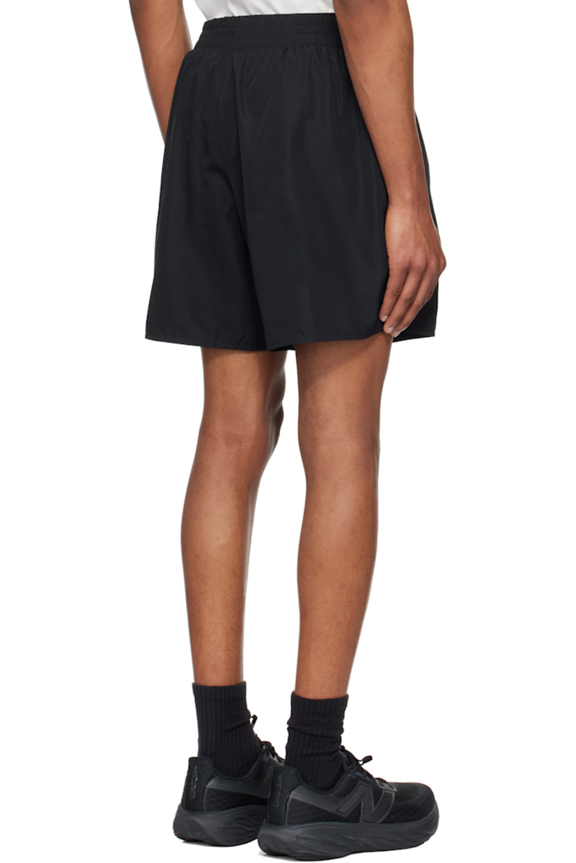 Polyester taffeta shorts.

· Elasticized waistband
· Two-pocket styling
· Bonded logo at cuff
· Vented cuffs

Supplier color: Black