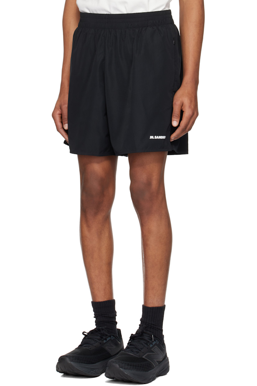 Polyester taffeta shorts.

· Elasticized waistband
· Two-pocket styling
· Bonded logo at cuff
· Vented cuffs

Supplier color: Black