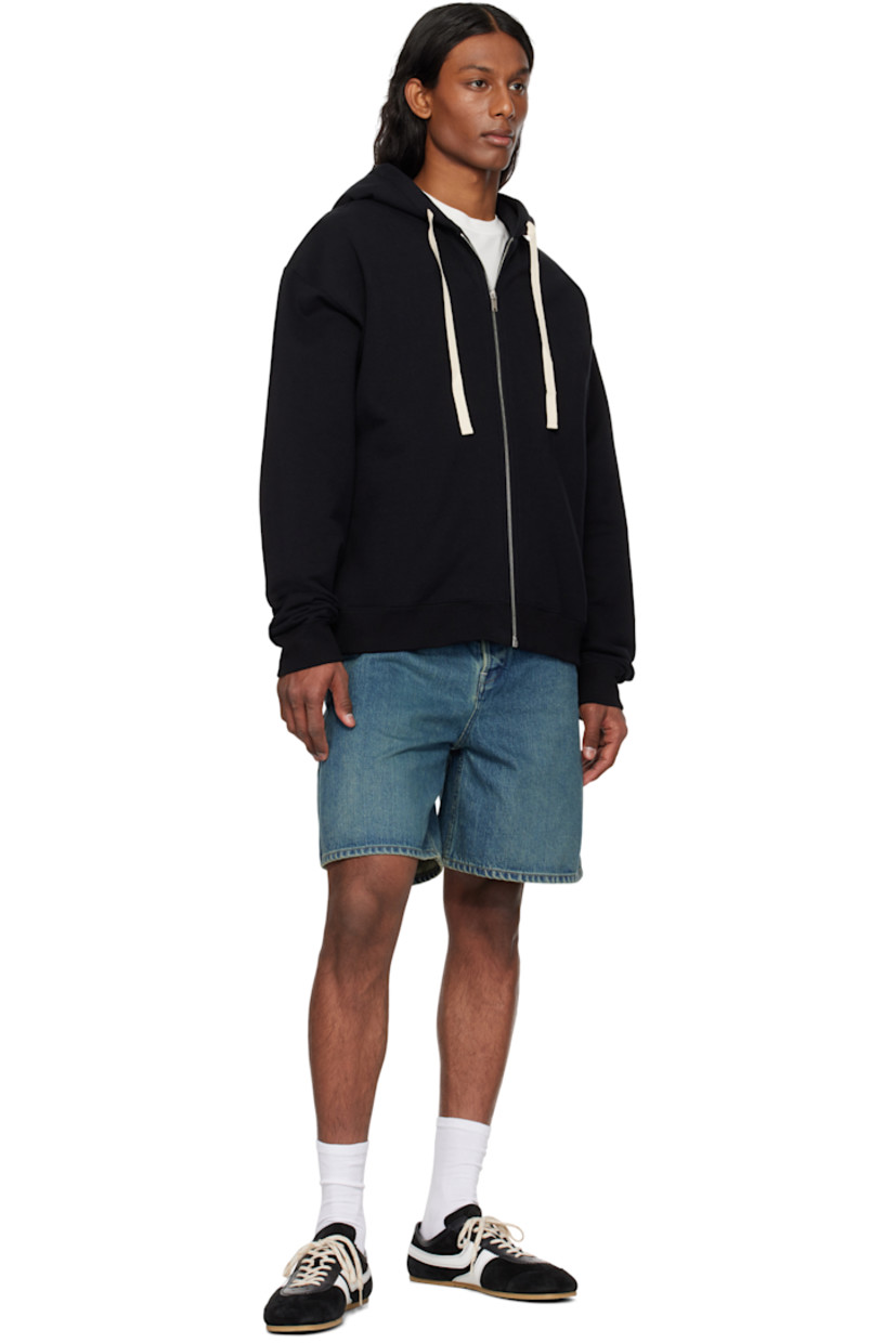 Non-stretch selvage denim shorts. Fading throughout.

· Belt loops
· Four-pocket styling
· Button fly
· Patch pockets at outseam
· Leather logo patch at back waistband
· Contrast stitching in white and beige

Supplier color: Blue