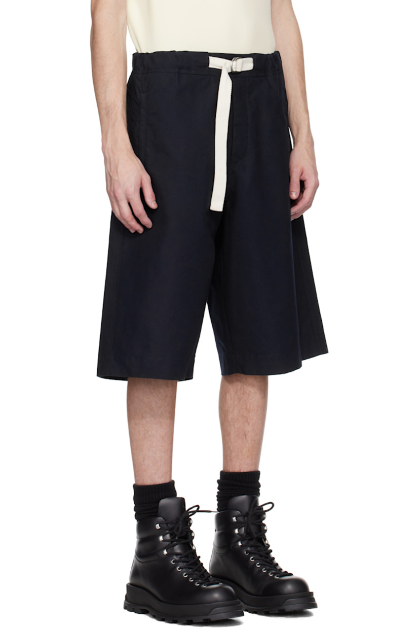 Loose-fit and wide-leg peached organic cotton twill shorts. 

· Water-repellent 
· Belt loops
· Integrated cinch belt at elasticized waistband  
· Four-pocket styling
· Zip fly
· Logo embroidered at back waist

Supplier color: Dark navy