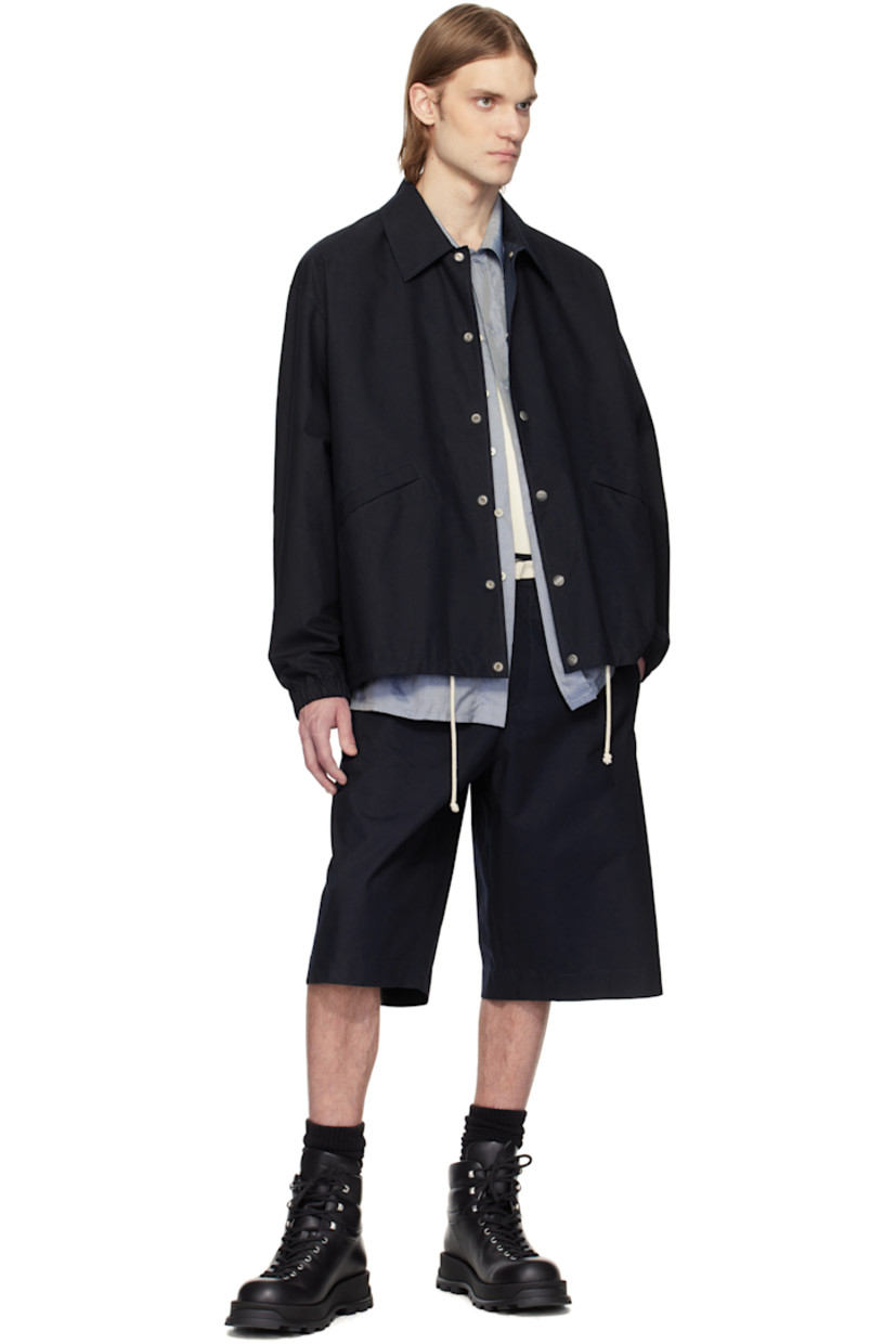 Loose-fit and wide-leg peached organic cotton twill shorts. 

· Water-repellent 
· Belt loops
· Integrated cinch belt at elasticized waistband  
· Four-pocket styling
· Zip fly
· Logo embroidered at back waist

Supplier color: Dark navy