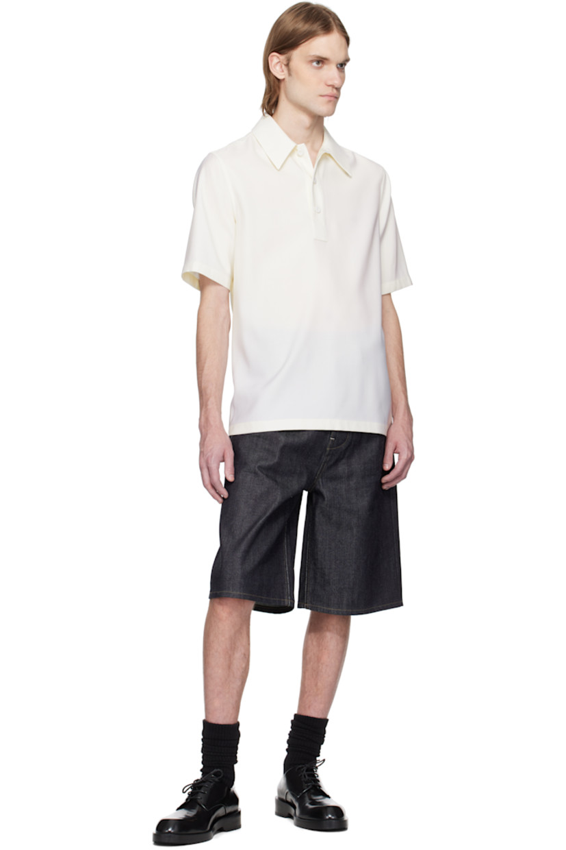 Virgin wool canvas polo. 

· Spread collar
· Three-button placket
· Partial viscose twill lining

Supplier color: Chalk