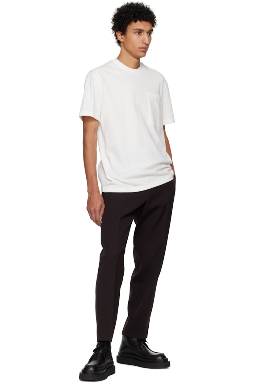Lightweight cotton jersey T-shirt.

· Rib-knit crewneck
· Patch pocket 
· Logo flag at back shoulder

Supplier color: Optic white