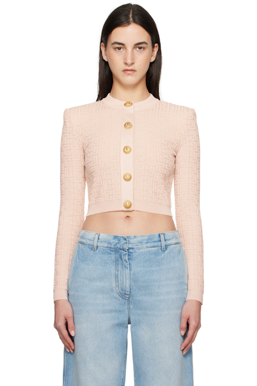 Knit viscose-blend cardigan. Jacquard logo pattern and metallic thread detailing throughout.

· Rib-knit crewneck, hem, and cuffs
· Press-stud closure
· Padded shoulders
· Graphic-engraved gold-tone hardware

Supplier color: Beige