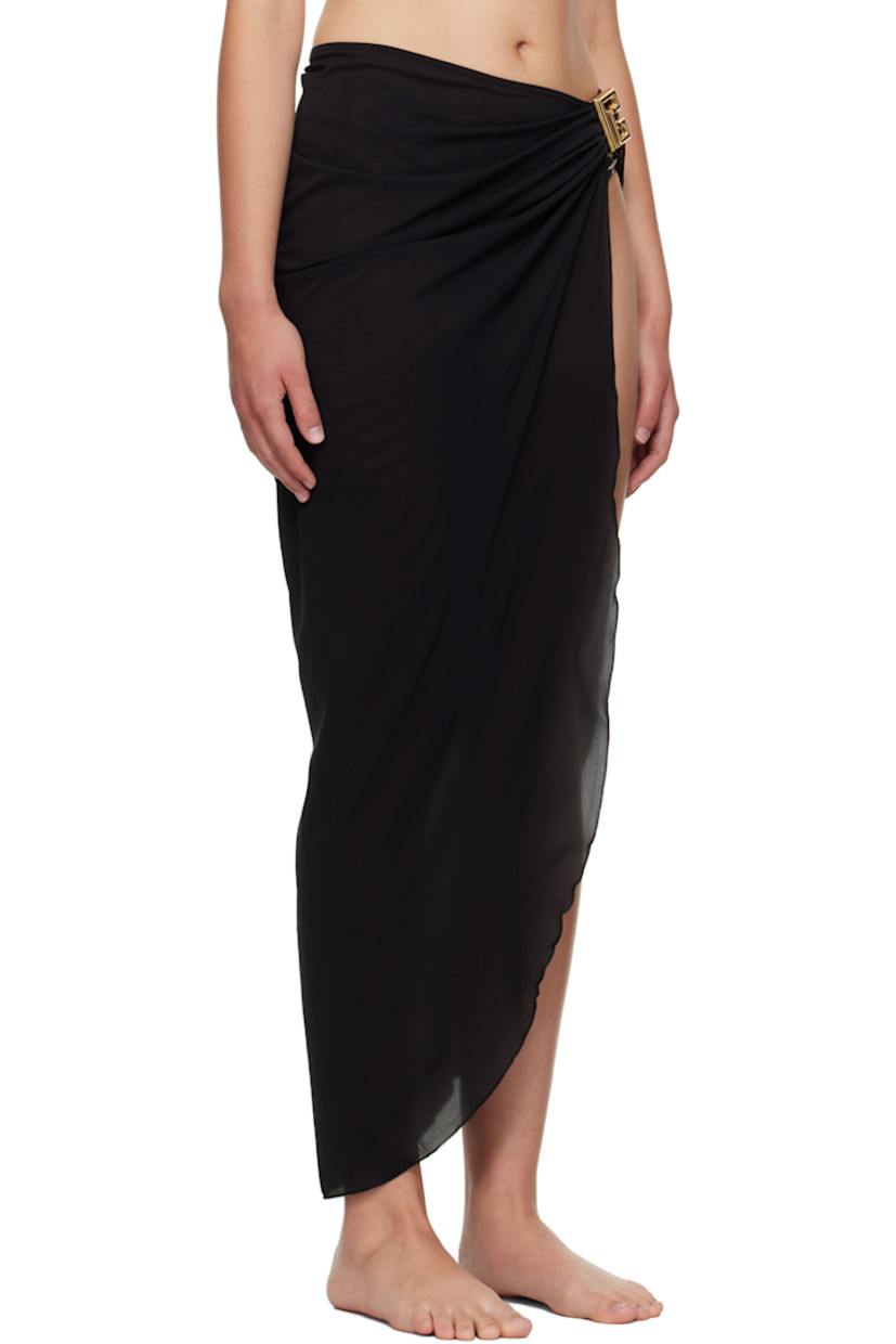 Semi-sheer stretch crêpe cover-up skirt.

· Wrap construction
· Gathering and logo hardware at elasticized waist
· Lettuce edge at vented hem

Supplier color: Black