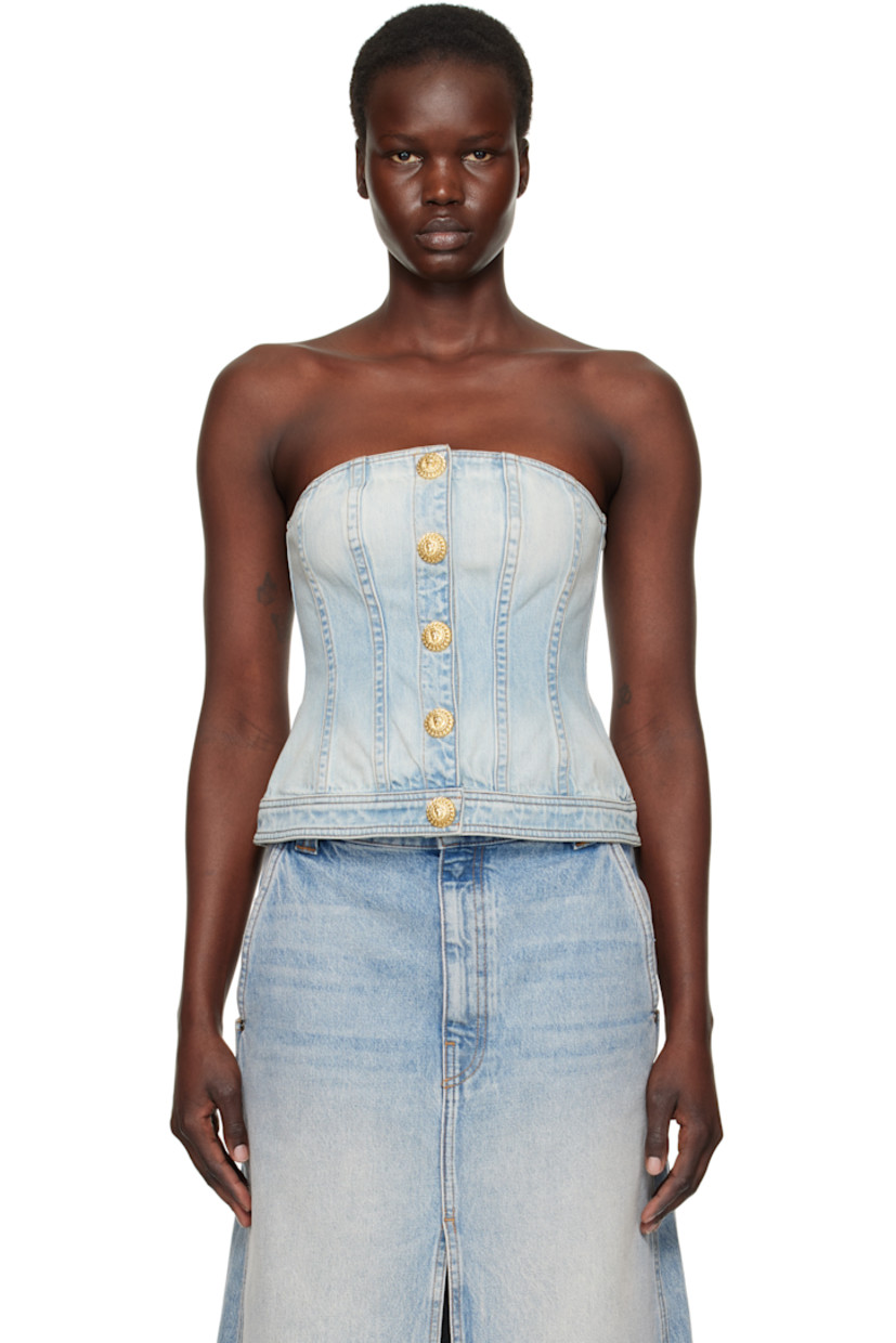 Non-stretch denim corset-style top. Boning throughout.

· Straight neck
· Press-stud closure
· Partial mesh lining
· Gold-tone logo graphic hardware
· Contrast stitching in tan

Supplier color: Bleu jean clair