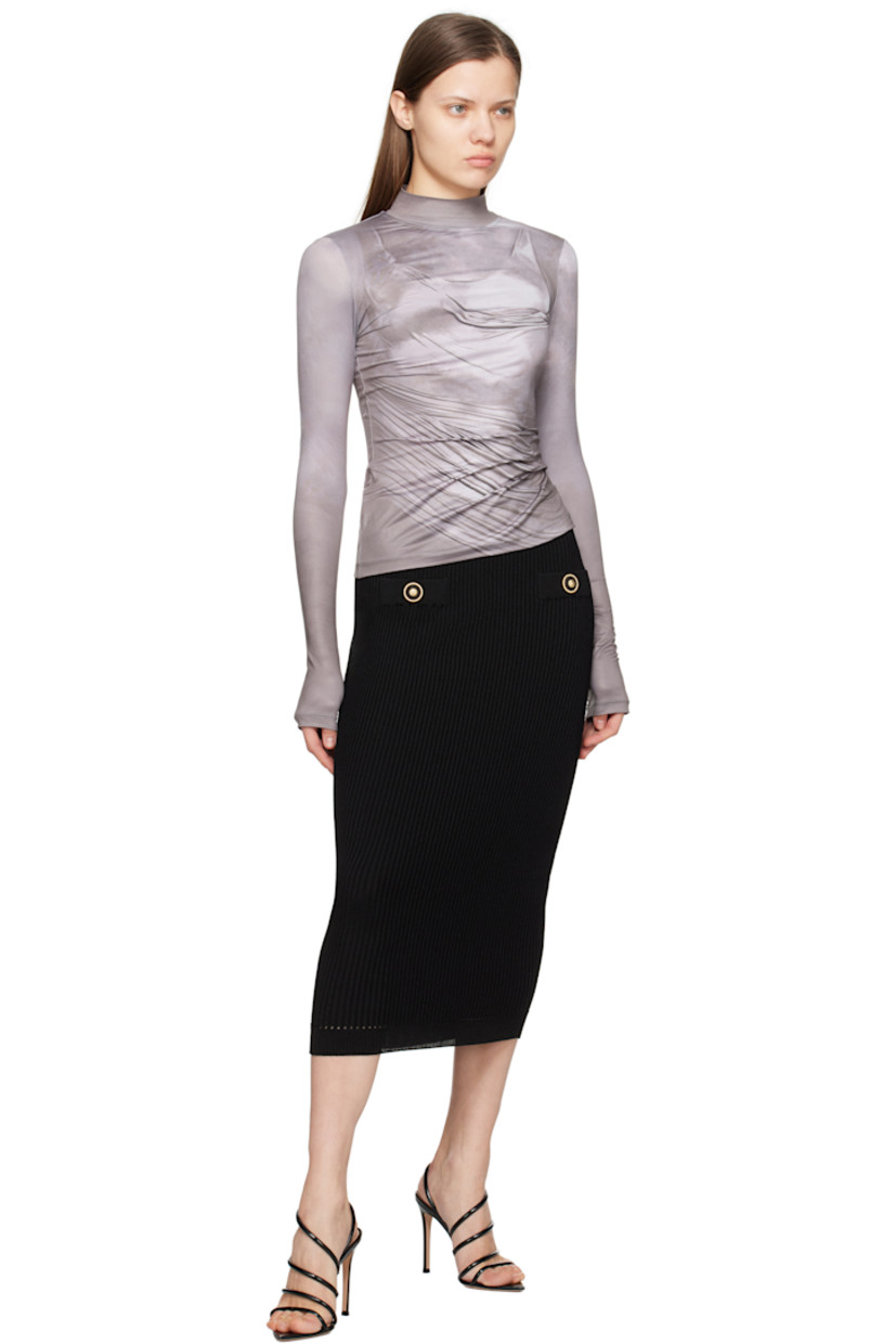 Stretch polyester jersey T-shirt. Trompe l'oeil graphic printed throughout.

· Mock neck
· Logo patch at back collar

Supplier color: Gris fonce