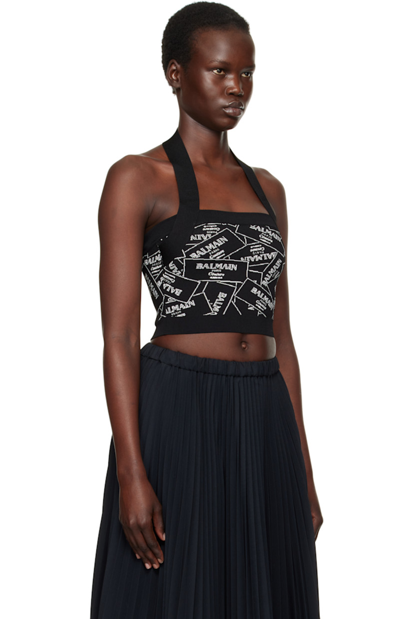 Rib-knit viscose-blend top. Jacquard logo graphic pattern throughout.

· Straight neck 
· Adjustable press-stud halter strap
· Zip closure at back
· Gold-tone logo graphic hardware

Supplier color: Black