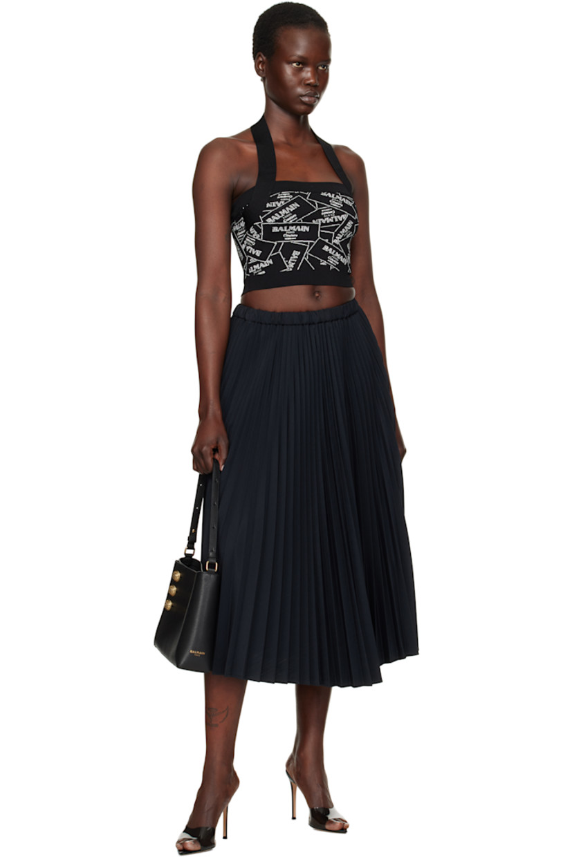 Rib-knit viscose-blend top. Jacquard logo graphic pattern throughout.

· Straight neck 
· Adjustable press-stud halter strap
· Zip closure at back
· Gold-tone logo graphic hardware

Supplier color: Black