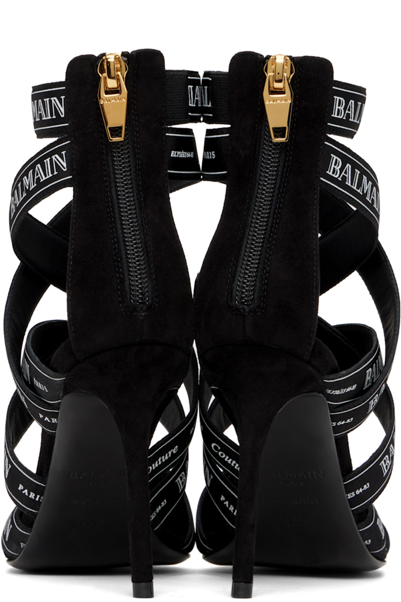 Goatskin suede heels in black. Logo-printed crisscrossing straps throughout.

· Pointed toe
· Zip closure at heel
· Logo stamp at leather footbed
· Covered stiletto heel with rubber injection
· Calfskin sole with rubber injection
· Heel: H4"

Supplier color: Black