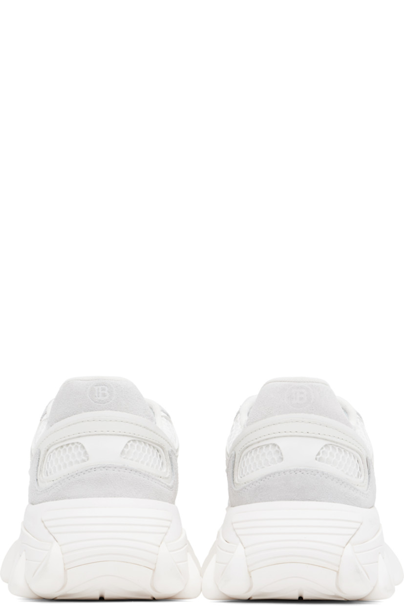 Low-top paneled mesh, buffed leather, and suede sneakers in white and gray.

· Lace-up closure
· Logo embroidered at padded tongue
· Padded collar
· Text bonded at outer side
· Logo embossed at heel tab
· Suede and mesh lining
· Logo embossed at sculptural rubber midsole
· Treaded rubber sole

Supplier color: White