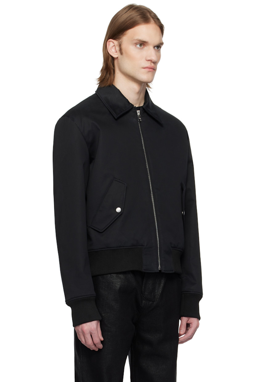 Insulated stretch cotton poplin bomber jacket.

· Spread collar
· Zip closure
· Flap pockets
· Rib-knit hem and cuffs
· Logo and text embossed at back
· Welt pocket at interior 
· Full satin lining 
· Logo-engraved silver-tone hardware

Supplier color: Black