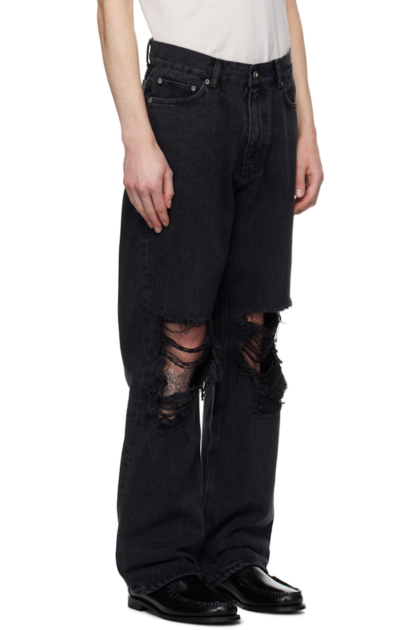 Straight-leg non-stretch denim jeans. Subtle fading throughout.

· Belt loops
· Five-pocket styling
· Zip fly
· Rip at knees
· Silver-tone hardware

Supplier color: Washed black