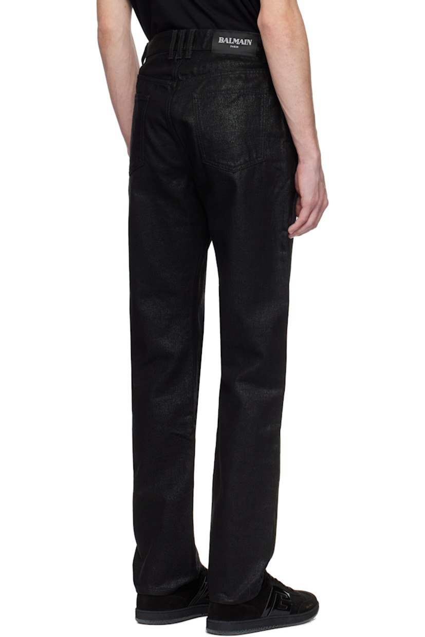 Coated non-stretch denim jeans.

· Belt loops
· Five-pocket styling
· Hook-eye placket at zip fly
· Logo patch at back waistband

Supplier color: Black