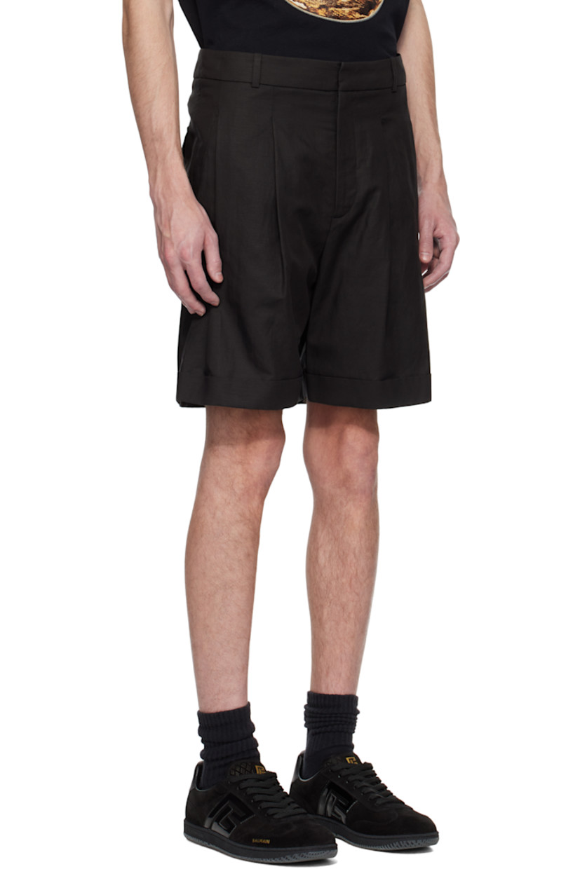 Lyocell- and hemp-blend broadcloth shorts. 

· Belt loops
· Four-pocket styling
· Zip fly
· Pleats at front 
· Rolled cuffs
· Partial plain-woven cotton lining 

Supplier color: Noir