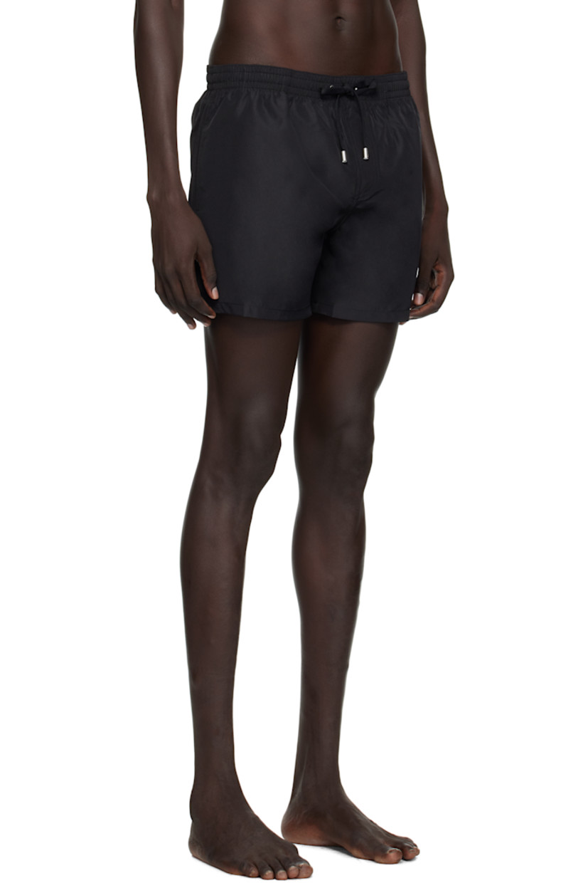 Taffeta swim shorts.

· Logo-woven drawstring at elasticized waistband
· Two-pocket styling
· Mock fly
· Logo embroidered at leg
· Integrated mesh briefs-style lining
· Logo-engraved silver-tone hardware

Supplier color: Black