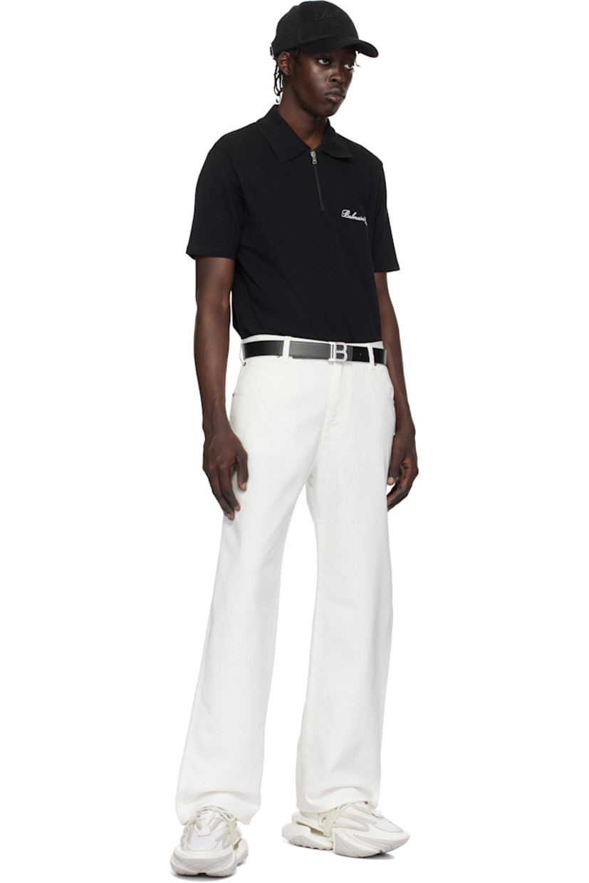 Cotton piqué polo.

· Rib-knit spread collar
· Half-zip closure
· Logo embroidered at chest
· Logo-engraved silver-tone hardware

Supplier color: Noir/Blanc