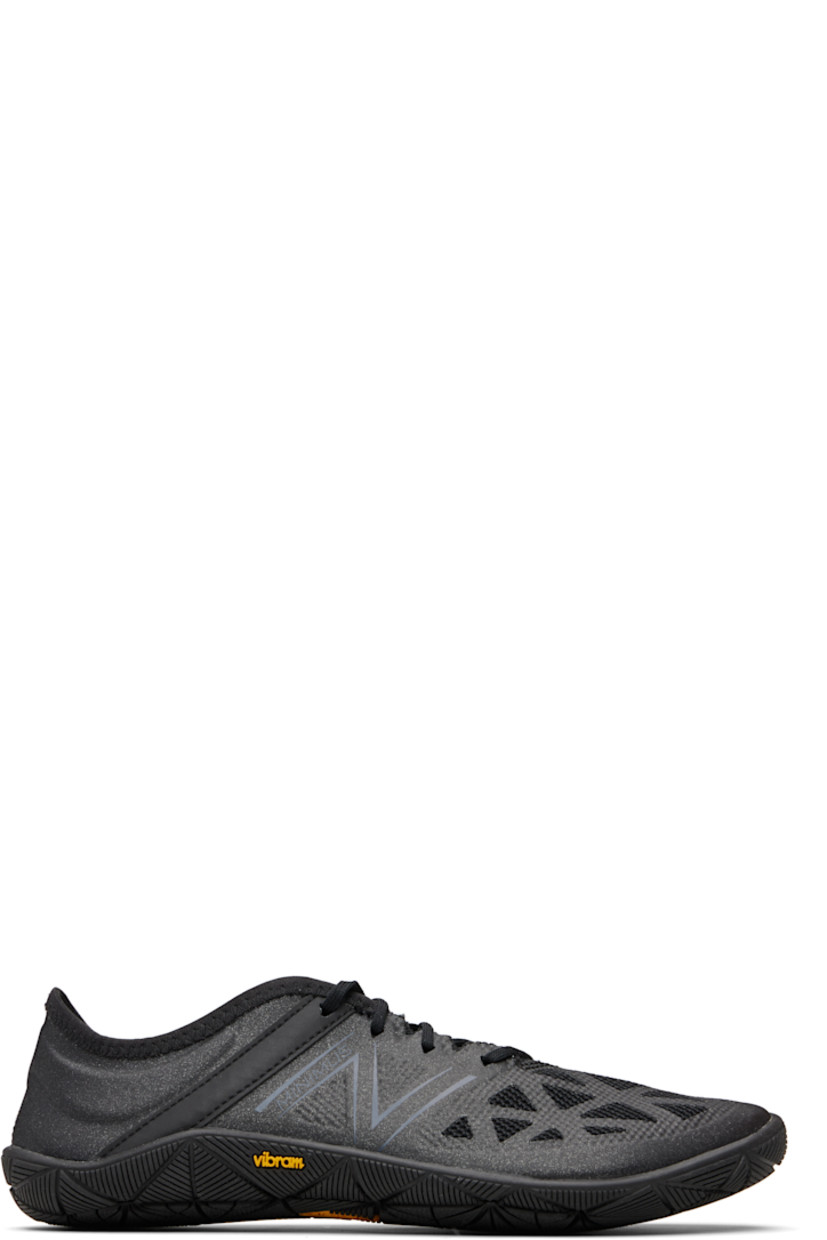Low-top coated woven sneakers.

· Lace-up closure
· Perforations at tongue
· Logo printed at sides and heel tab
· Text printed at outer side
· Treaded Vibram® rubber sole

Part of the Junya Watanabe x New Balance collaboration.

Supplier color: Black