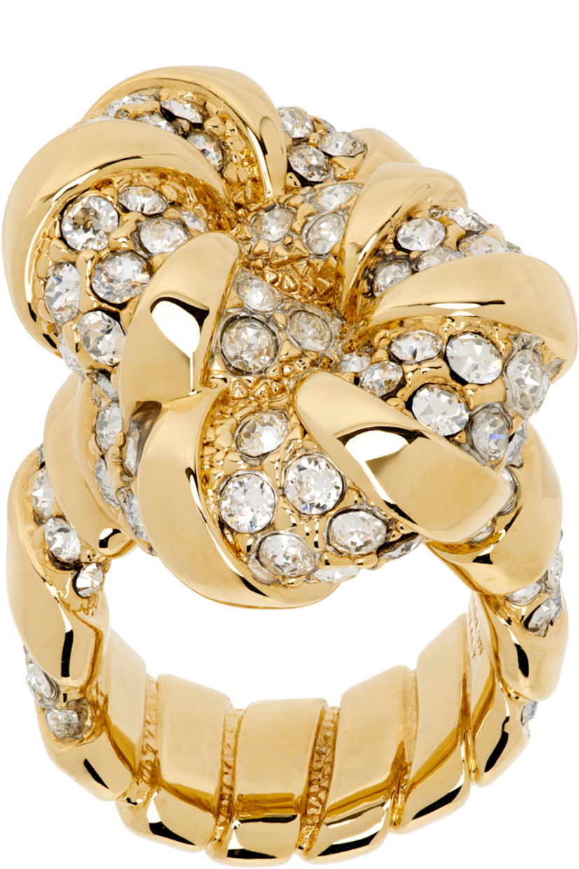 Ring in gold-tone brass. Pavé-set glass crystals throughout.

Supplier color: Gold/Crystal