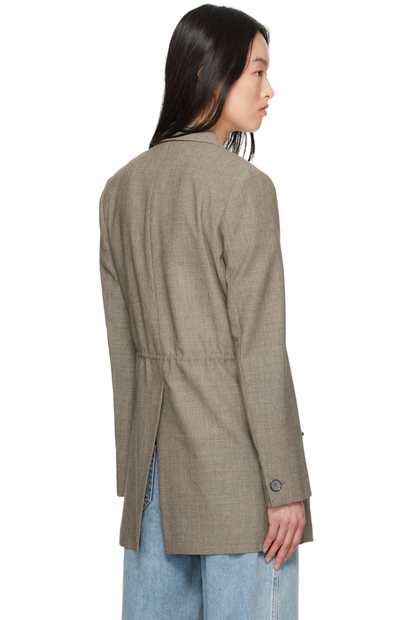 Plain-woven virgin wool blazer.

· Button fastening at notched lapel 
· Two-button closure 
· Self-tie fastening at front
· Welt pocket and flap pockets
· Padded shoulders
· Button fastening at vented cuffs 
· Central vent at back hem
· Partial bemberg lining

Supplier color: Lin