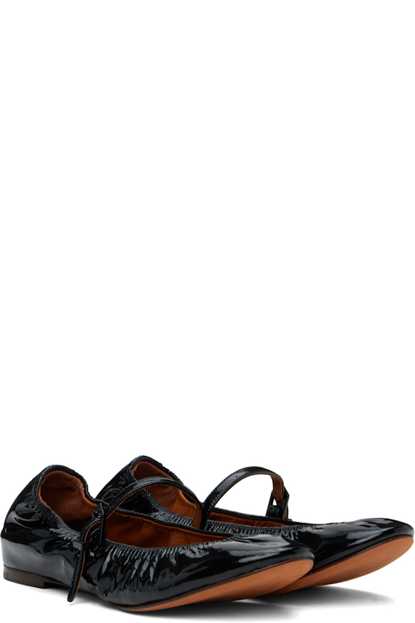 Patent calfskin ballerina flats in black. 

· Elasticized collar 
· Pin-buckle strap at vamp
· Gold-tone logo stamp at heel counter 
· Buffed leather and suede lining 
· Suede sole with rubber injection 

Supplier color: Black
